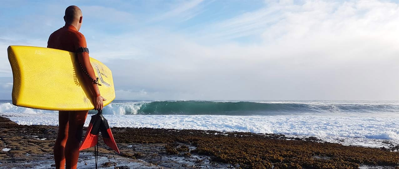 Bodyboarder with fins
