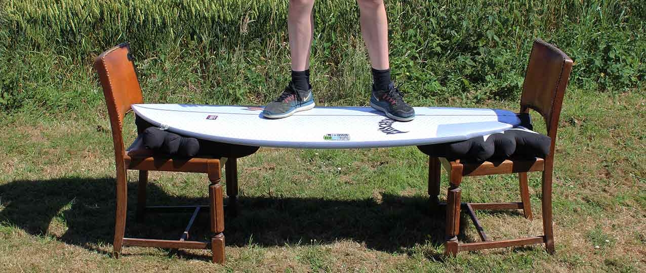 Lib Tech x Lost Surfer standing on surfboard