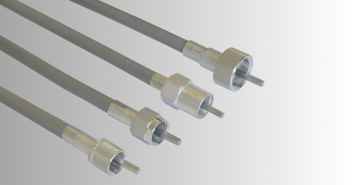 Grey motorcycle speedometer and tachometer cables