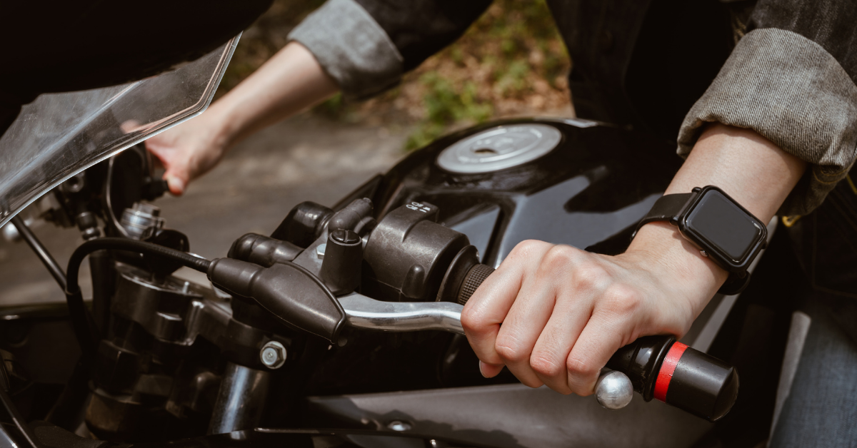Riding a motorcycle - hand on clutch